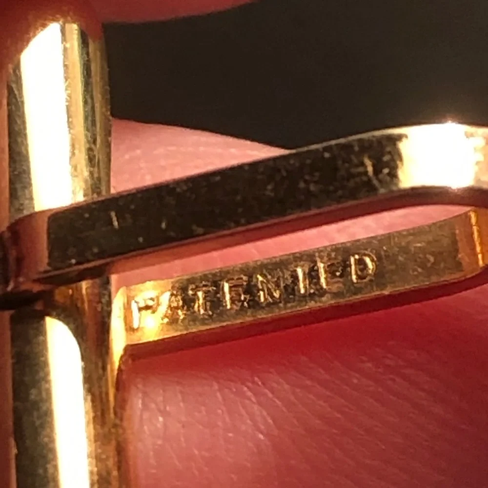 Antique Krementz engraved gold oval amber accent cuff links